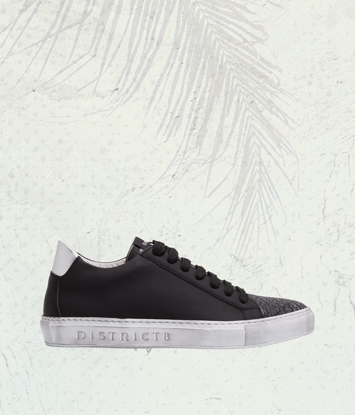 DISTRICT8 - Sneakers Wet Paint (844) in pelle gommata nera, punta in vera pelle di squalo e logo laserizzato